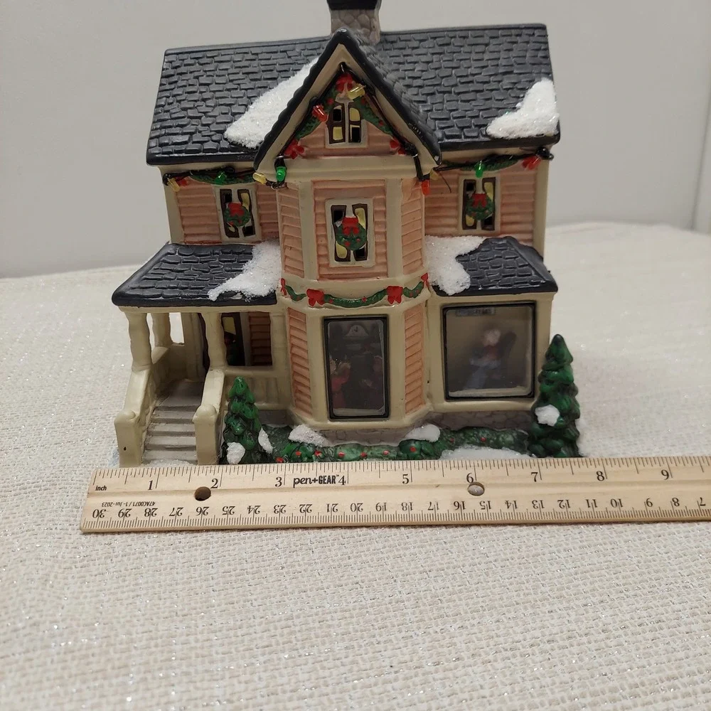 St Nicholas Square Village Collection 2013 Decorating the Tree Illuminated House